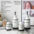 Minimalist black and white ceramic seasoning set with four oil and vinegar bottles - Kitchen Seasoning 4-Piece Set