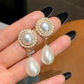 Detail of gold vintage pearl hoop earrings with zircon accents and teardrop pendants - Vintage Square Pearl Drop (ER21Y0825)
