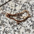 Minimalist golden bird-shaped alloy hair clip with hollow outline design - Bird Shape Gold