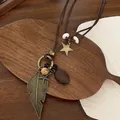 Bohemian vintage lange ketting met bronzen blad, zeester en houten kralen aan bruin touw - Gouden Grote Veer Ster Stijl (4# Ketting)