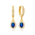 Macro detail of gold hoop earrings featuring oval blue stones with sparkling white zircon halo - Blue Gold
