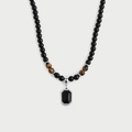 Minimalistische zwarte kralenketting met bruine tijgeroogstenen en een zwarte rechthoekige hanger - Tijgeroog
