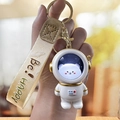 Cute ivory space bear astronaut keychain with glowing LED helmet and Be Happy strap - Glow Astronaut - String Gold Bear