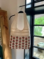 Detail of hand-crocheted tote bag with red floral patterns and breathable mesh design - Apricot