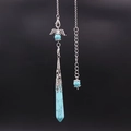 Silver angel wing necklace with a turquoise hexagonal crystal pendulum pendant - Turquoise