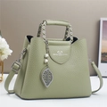 Litchi pattern sage green shoulder bag with leaf charm and pearl detail in premium finish - Green