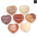 Set of seven polished 20mm heart-shaped natural crystal stones in assorted colors - Red Aventurine