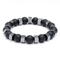 Unisex matte black onyx beads bracelet with geometric metallic spacers on white background - Black