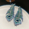 Elegant 925 silver needle peacock feather earrings set with green and blue zircons - Feather Tassel Style (12#)