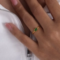 Minimalist gold titanium ring featuring an oval green gemstone in a bezel setting - US 6 / Gold Green Glass