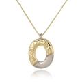 Detail of gold necklace pendant with hammered texture and two-tone silver contrast - Letter O