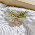 Golden butterfly brooch with sparkling translucent green wings and rhinestone accents - Gold Green Butterfly