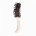 Ergonomic S-shaped hair styling comb with white curved handle and dark bristles for volume - White