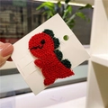 Cute red and dark green knitted dinosaur hair clip for girls on a white card - Red Dinosaur