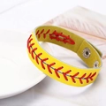 Detail showing yellow baseball leather texture with red cross stitching and metal button - Yellow Baseball Bracelet (Bracelet 2)