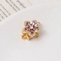 Macro detail of a golden rotating flower clasp with purple crystals for DIY jewelry - 21# 14K Gold Single Row (16*21mm)