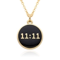 Macro view of a 18K gold plated necklace with a black enamel 11:11 circular pendant - Black (B009)