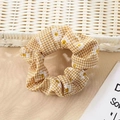 Yellow plaid scrunchie with white daisy prints on a soft textured fabric material - Yellow Grid Daisy