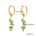 Macro detail of 18k gold plated fan earrings with green stones and precise dimensions - Gold Olive Branch Zirconia Earrings