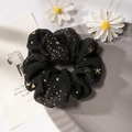 Elegant black organza scrunchie with gold star pattern for women's hair styling - Star Black
