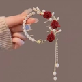 Golden retro hair clip with red rose, faux pearls and tassel pendant held in hand - F0401 Gold Red Vintage Rose