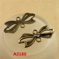 Vintage bronze zinc alloy bow charms for DIY jewelry making featuring dual hanging loops - A2180-11*24MM