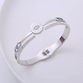 Bracciale rigido aperto a doppio strato con occhio del male e zirconi cubici bianchi - Color Acciaio