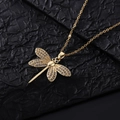 Golden dragonfly pendant necklace featuring micro-set zircons on black textured background - Style R-Gold Pave Black Eyes O-chain