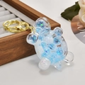 Blue liquid quicksand turtle keychain with sparkling glitter and gold ring - Luminous Blue