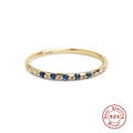 Macro detail of gold plated 925 silver ring featuring blue gemstones and white zircons - Blue Zirconia 5-Stone Row Pavé Gold Style (Style 10-Blue)