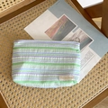 Striped bubble texture makeup bag in green and purple with fun fun party label - Pleated Stripe Storage Bag - Green