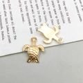 Golden sea turtle alloy pendant charms showing front and back view for DIY jewelry - 1Pc KC Gold Sea Turtle 7*10mm