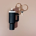 Mini black cup keychain with golden ring and black heart charm for backpacks - Black