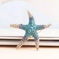 Sparkling starfish brooch with blue gradient rhinestones and gold alloy base setting - Blue