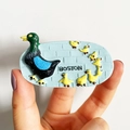 3D resin fridge magnet featuring a duck family with Boston text on a light blue base - (85) Boston Ducks