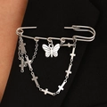 Detail of silver chain brooch with butterfly and cross charms on black punk style suit - Chain Butterfly Cross Style (5964)