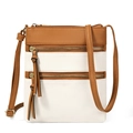 Close-up of brown and white vertical crossbody bag showing multi-zippered pocket details - White and Brown
