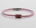 Detail of pink braided rope bracelet with rose gold clasp and purple teardrop stone - Pink Leather + Rose Gold Charm