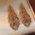 Vintage gold feather earrings with sparkling amber crystals and Bohemian rhinestone details - Feather Style (HE30694) / Coffee-Yellow (Gold Base)