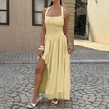 Elegante abito lungo giallo pallido allacciato al collo con pieghe e spacco laterale - M / Giallo