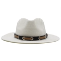 Close-up of white woven straw hat with black-brown decorative band and silver metal eyelets - M (56-58cm) / White