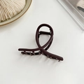 Matte dark brown metal hair claw clip with cross knot design in chocolate finish - Brown