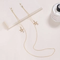 Detailed view of golden eyewear chain featuring white pearls and hollow star charms - Pentagram Pearl