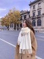Soft creamy white winter cashmere scarf with elegant tassel trim worn in a street setting - Thickened Tassel Style (350g) / 200*70cm / White
