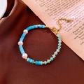 Detail of blue bead bracelet with white pearls, gold spacers and lobster clasp - 19# Bracelet-Blue-White-Gold Beads