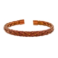 Macro shot of red-brown twisted wire mesh weave on stainless steel cuff bracelet - Burgundy