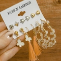 Detailed view of vintage gold geometric earrings set with pearls and star studs on display - E039/Diverse Style / Gold/Multicolor
