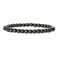Bracelet en perles noires polies avec pierres rondes lisses et cordon élastique - Hématite