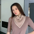 Fashionable beige and brown geometric knit scarf worn by model for warm outdoor style - Wangfu Khaki