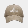Close-up of the vintage khaki baseball cap with BELIEVE embroidery and cross detail - Khaki